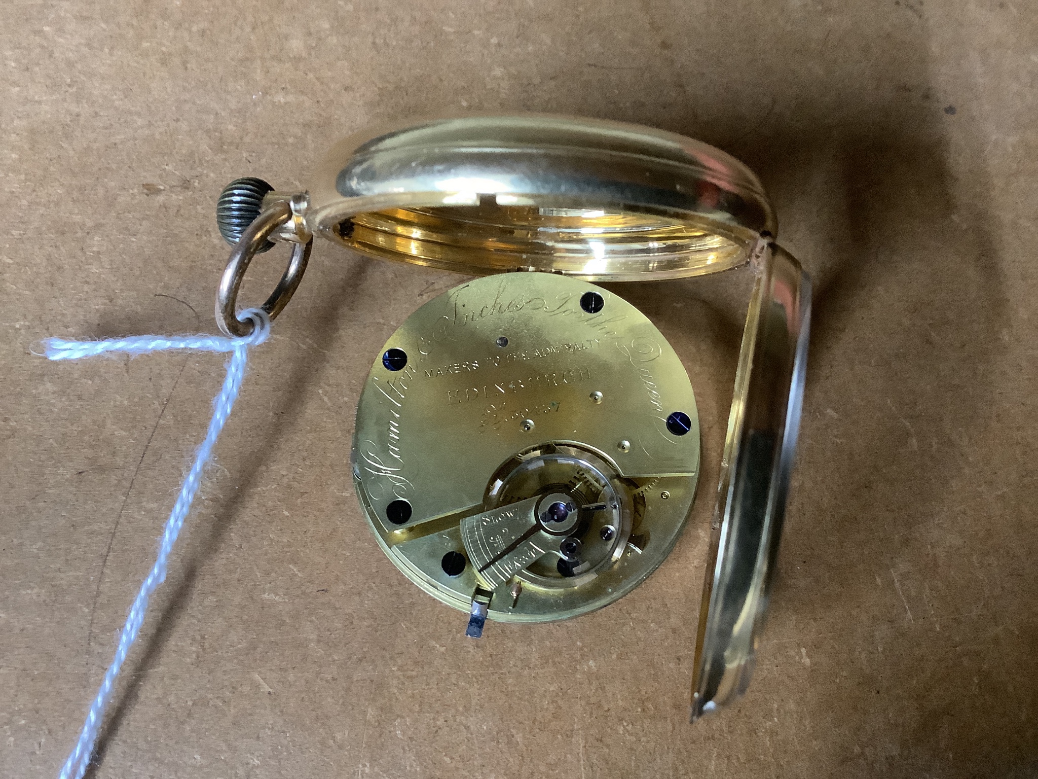 A late Victorian 18ct gold open faced keyless pocket watch, by Hamilton & Inches, with signed three quarter plate movement, case diameter 48mm, gross weight 85.4 grams.